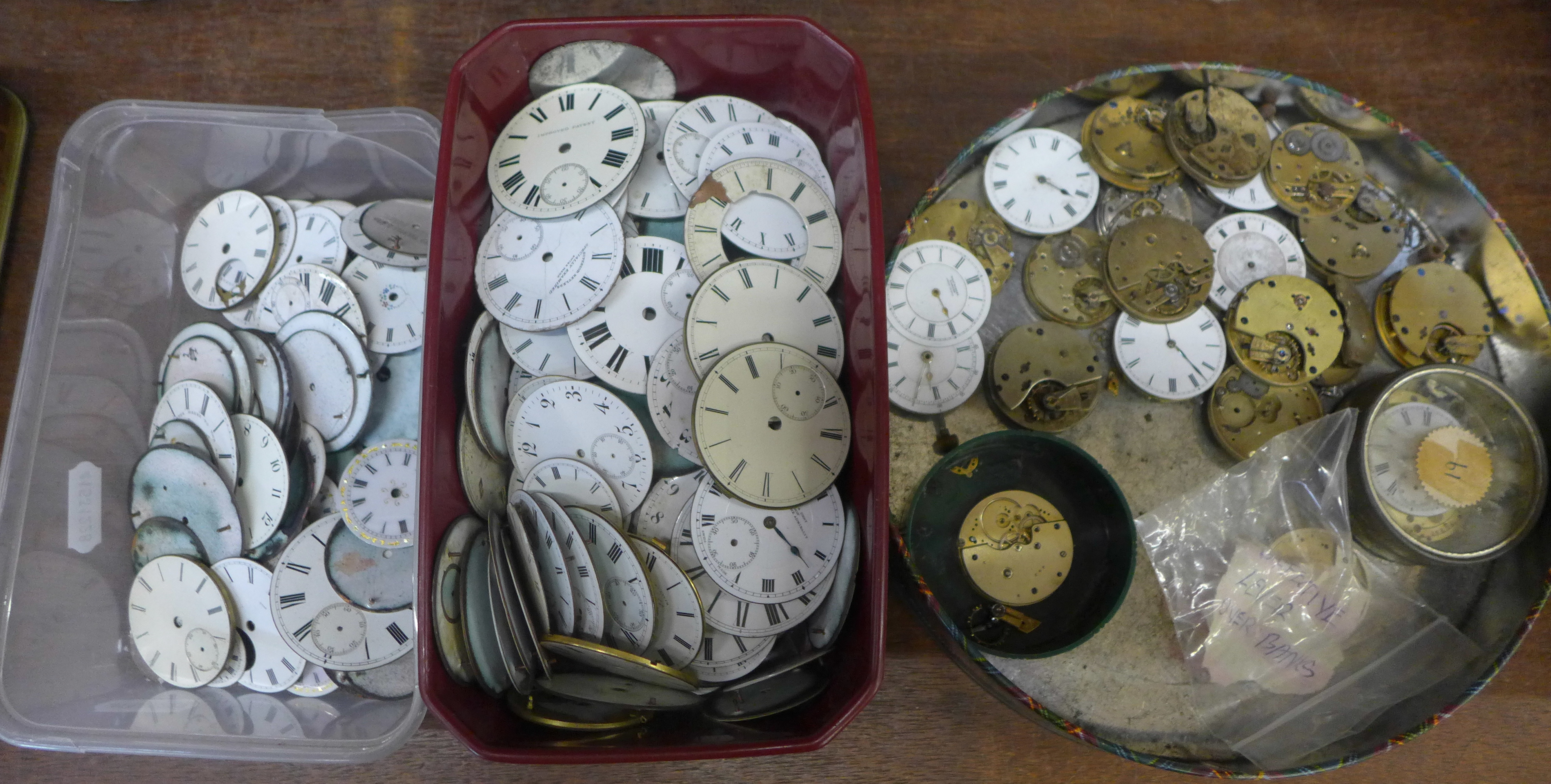 A collection of watch movements and dials