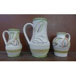 Three Langley pottery jugs, tallest 24.5cm