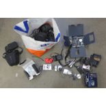 A large collection of digital cameras, Panasonic Lumix, Sony, Nikon, some boxed and with