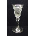 A Jacobite glass, circa 1780, engraved with two bees and faceted stem, 17cm