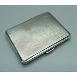 A silver cigarette case, Birmingham 1930, 64g, 60mm x 78mm