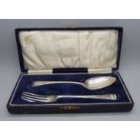 A silver fork and spoon christening set, 75.6g, fork George William Adams, London 1858, spoon