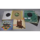 A collection of twelve The Beatles and related 7" singles including two EPs, Magical Mystery Tour,
