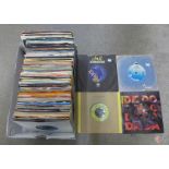 A box of 120 7" singles including '70's and '80's, including Police, David Bowie, Blondie, U2, etc.