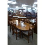 A McIntosh teak extending dining table and eight chairs