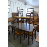 A Fyne Ladye afromosia extending dining table and six chairs, designed by Richard Hornby