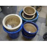 Six assorted glazed terracotta plant pots