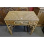 A beech and wicker single drawer desk