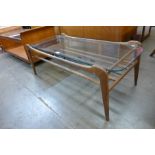 A Danish teak and glass topped rectangular coffee table