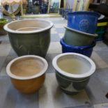 Eight assorted glazed terracotta plant pots