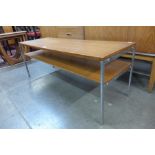 A teak and chrome two tier rectangular coffee table
