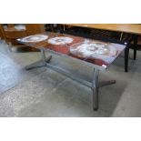 A chrome and tiled topped rectangular coffee table