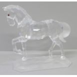 A Swarovski model of a horse, boxed and with leaflet