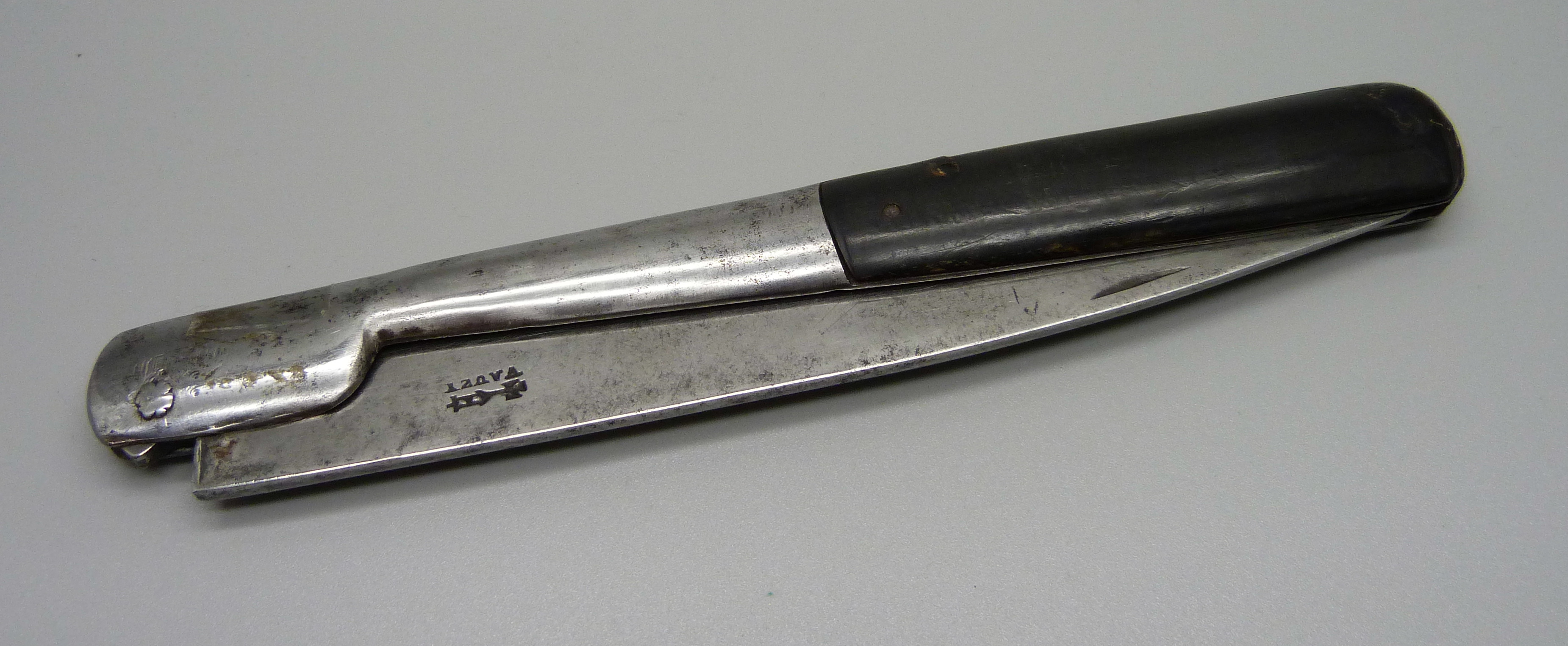 A Louis Vauzy folding knife with horn handle, 35cm open