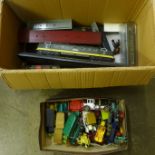 A collection of die-cast vehicles and model trains for display only