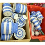 A box of TG Green storage jars and a box of TG Green kitchenalia including rolling pin and flour/