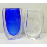 Two small Kosta art glass vases designed by Vicke Lindstrand, one in cased blue and one with