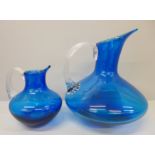 Two kingfisher blue Whitefriars beak jugs, 17cm and 11cm tall