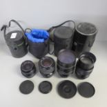 Five camera lenses; Carl Zeiss Jena 28mm, Sigma 70mm, Topcor 100mm and 135mm and Marep 300mm