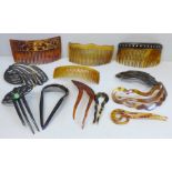 A collection of hair combs and clips including horn and tortoiseshell