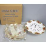 A Royal Albert Old Country Roses clock and 3-tier cake stand