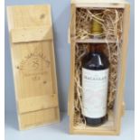 A bottle of The Macallan over 25 years Old Anniversary Malt Whisky, boxed