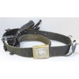 A WWII German belt with SS buckle (soldered back, not stamped) and attached Y harness