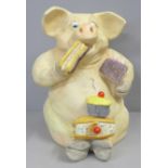 A pig eating cake figure, 27cm