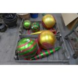 Assorted large Christmas bauble decorations, two pine potato crates and dinnerware