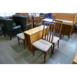A G-Plan Fresco teak drop-leaf dining table and four chairs