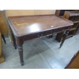 A George IV mahogany two drawer writing table