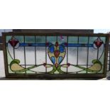 A large Art Nouveau stained glass window