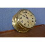 A brass ship's style wall clock