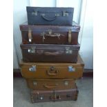 Six vintage suitcases