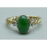 An 18ct gold, jade and diamond ring, marked 750, 4g, M