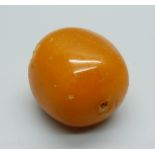 A butterscotch amber bead, 15g