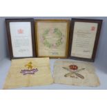 Two military embroideries, one framed in memorium embroidery and two Royal commendations, framed