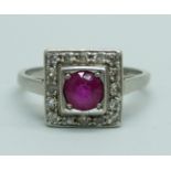 An Art Deco platinum, diamond and ruby ring, 4.7g, L, ring top 10mm x 10mm, small chip on the ruby