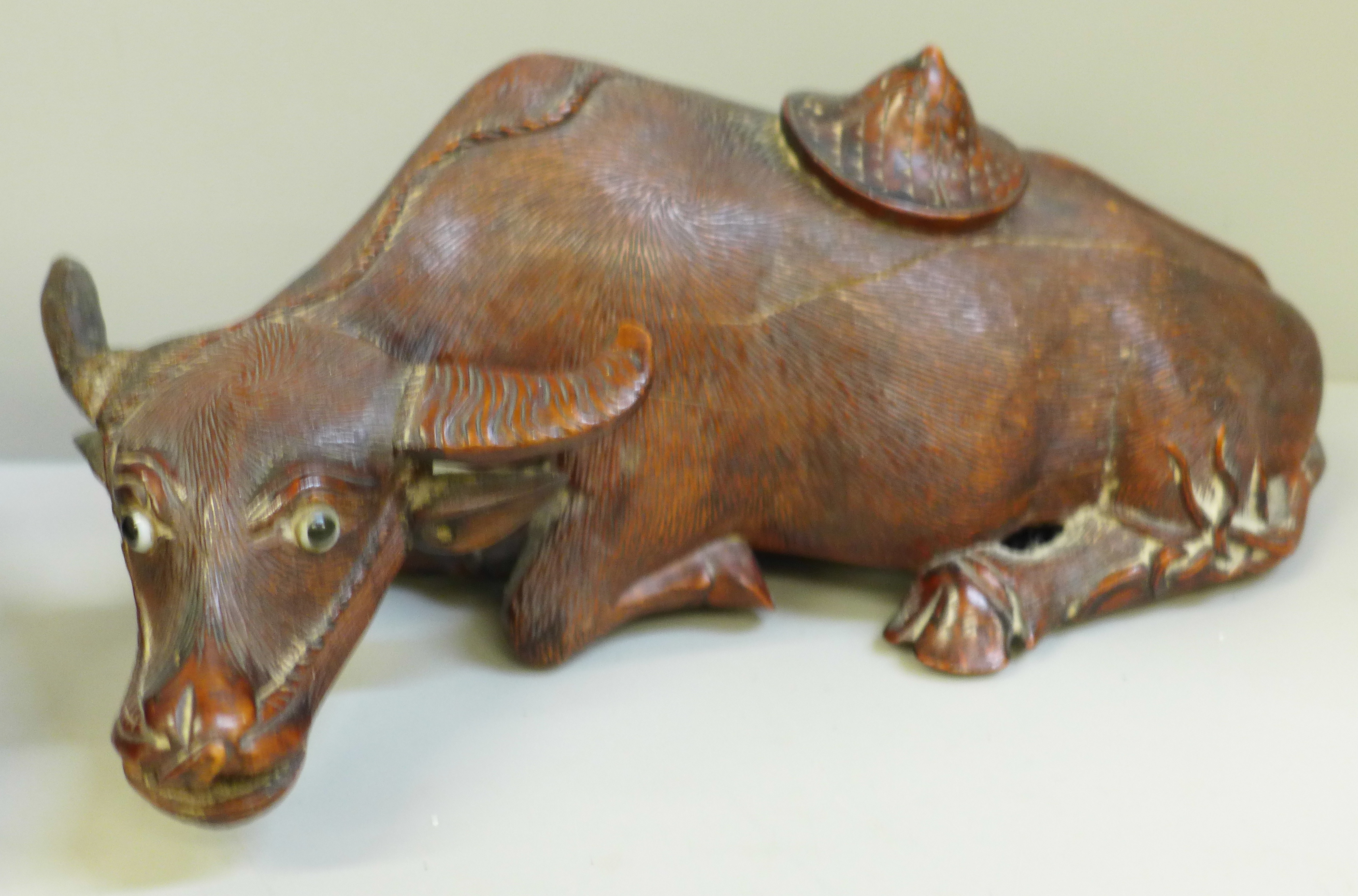 A pair of Chinese carved wooden models of water buffalo, both with damaged horns and splits to body, - Image 3 of 6