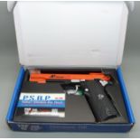 An Xtreme 45 CO2 powered airsoft gun, boxed