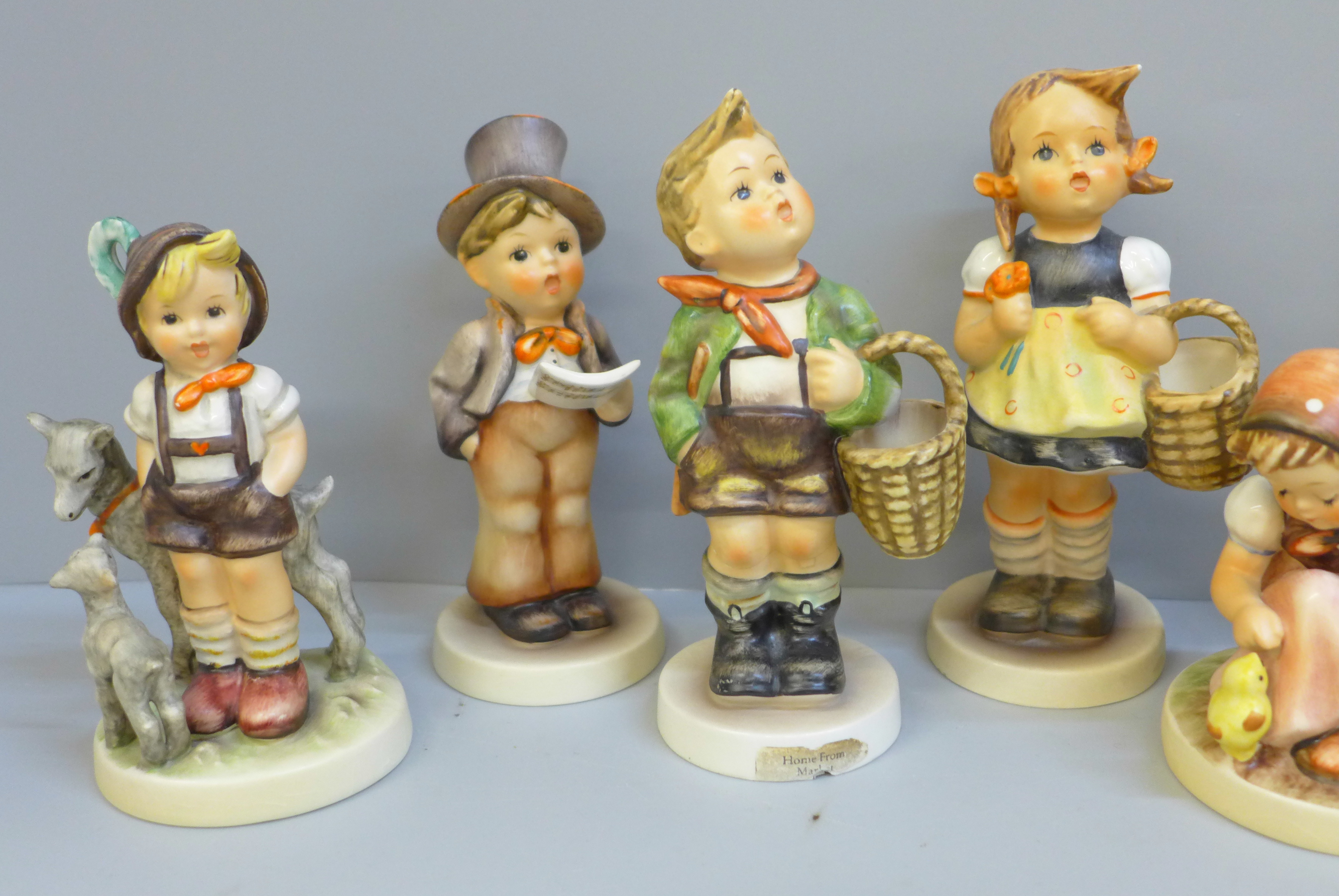 Eight Hummel/Goebel figures, two a/f, small chip to umbrella and to base - Image 2 of 5