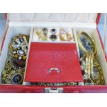 A jewellery box and contents including dress rings, gold tone, etc.