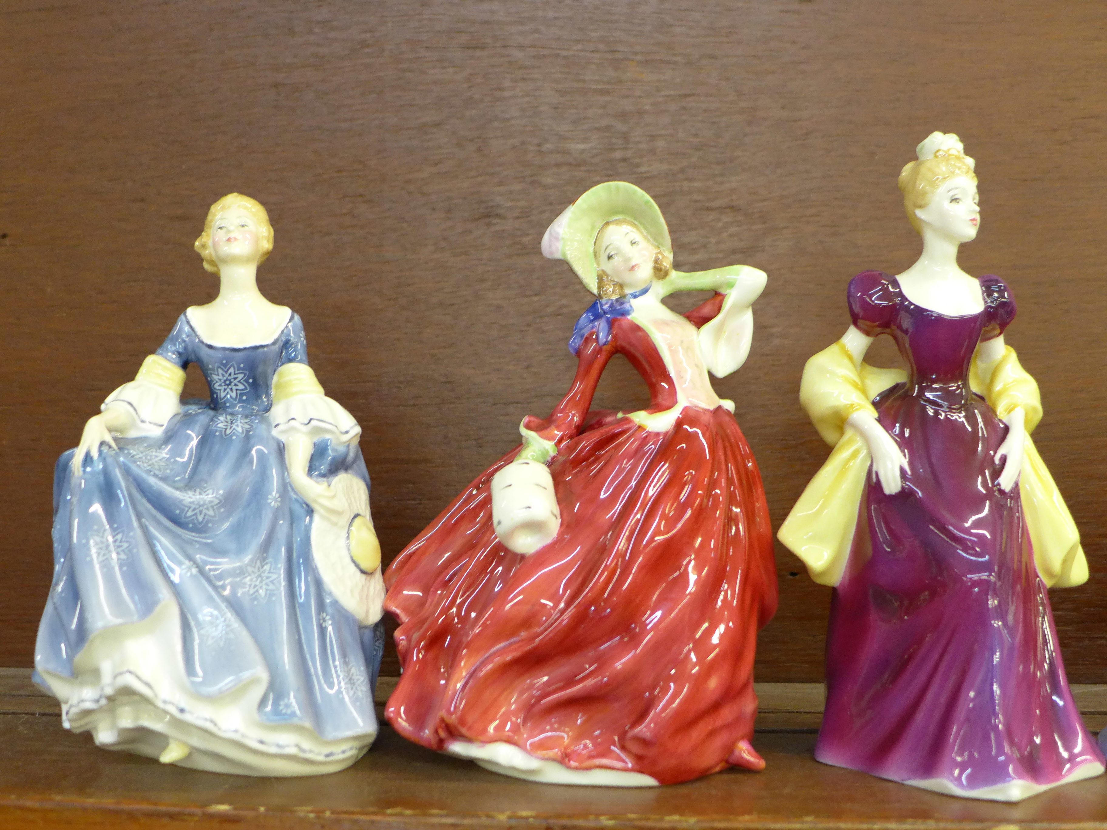 Five Royal Doulton figures; Autumn Breezes, Hilary, Loretta, The Hostess of Williamsburg, a/f, and - Image 2 of 4