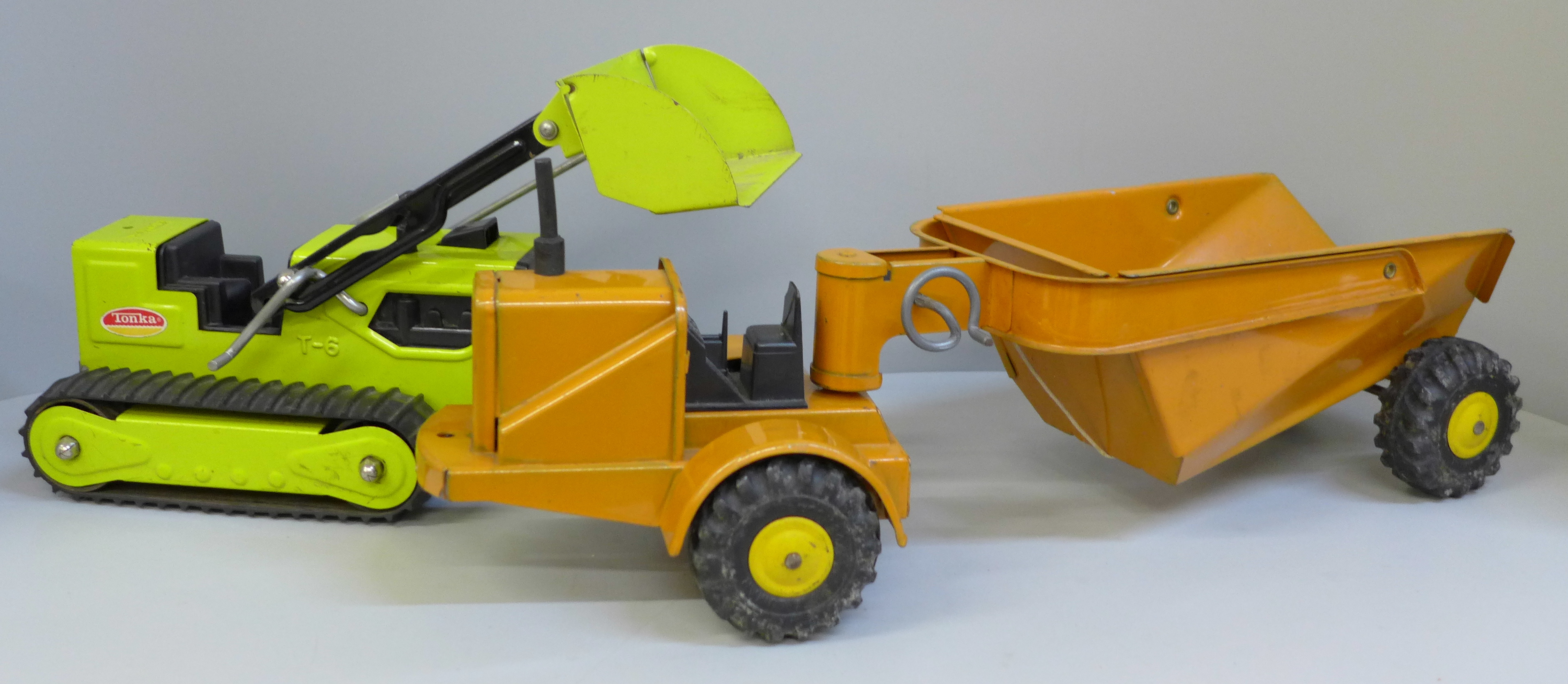 A Marx Earth Mover and Tonka Tractor