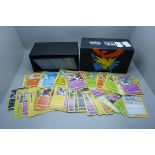 500 Pokemon cards, various sets in collectors box