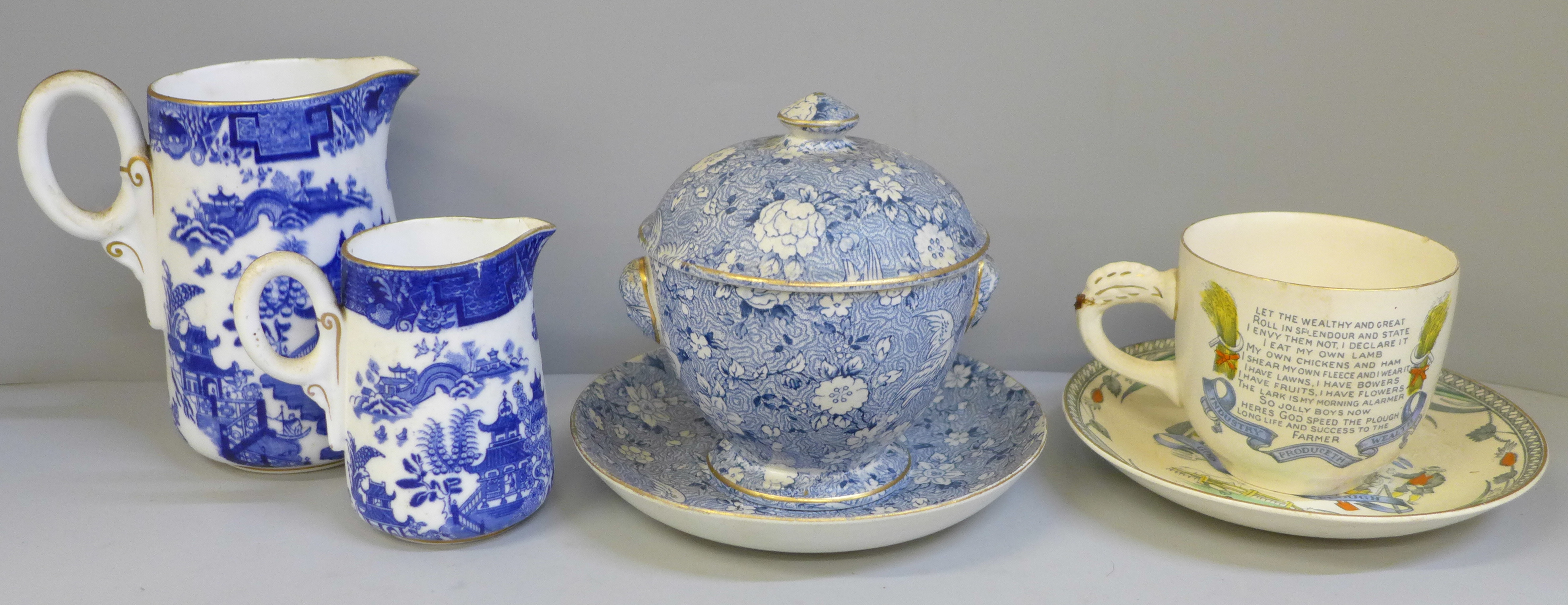 Two Royal Worcester blue and white jugs, one a/f, a God Speed The Plough cup and saucer, chip to rim