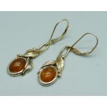 A pair of 9ct gold and amber drop earrings, 3.9g