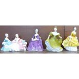 A Royal Doulton figure group, The Love Letter, and three Royal Doulton figures, Charlotte, Lynne and