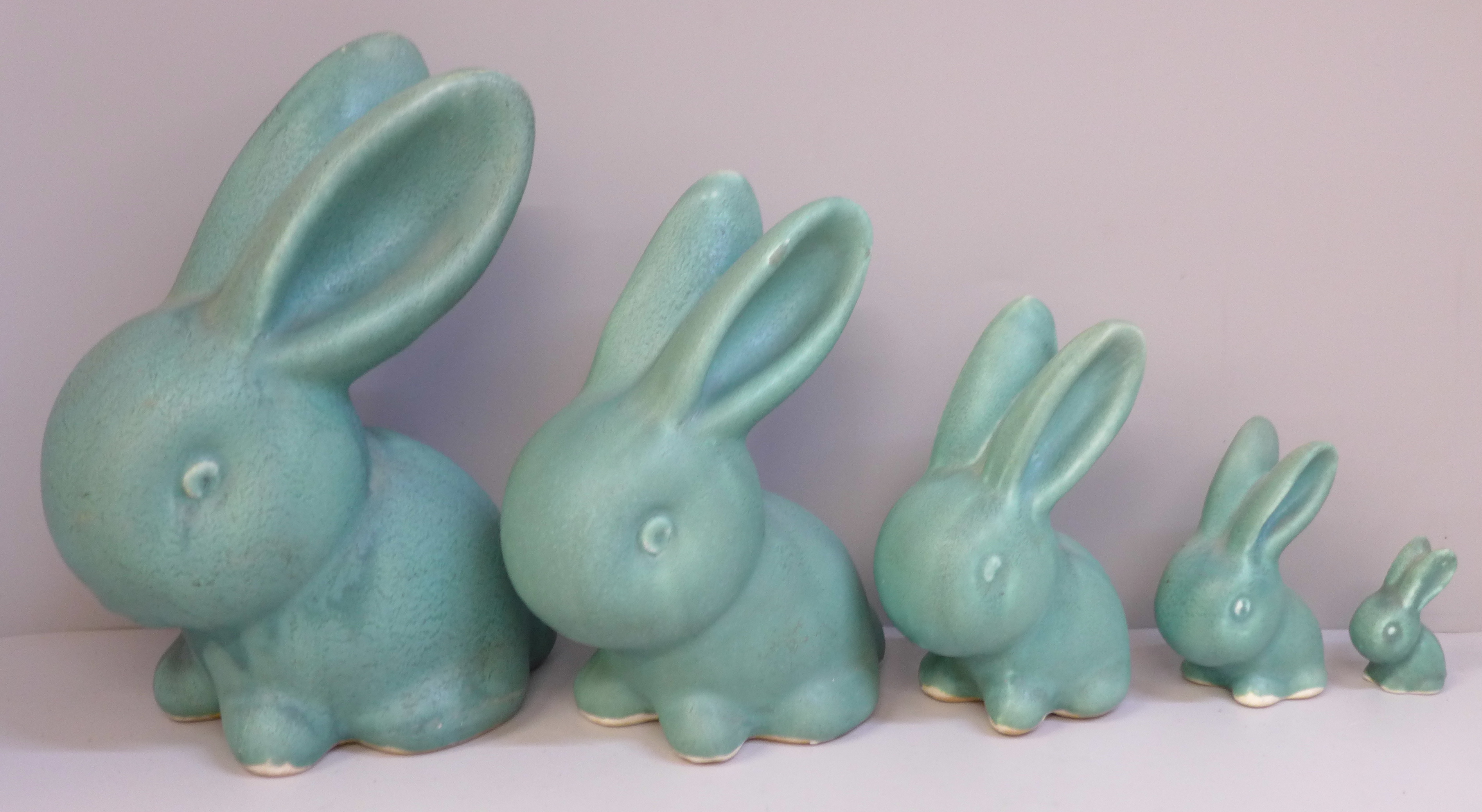 A graduated set of five Bourne Denby rabbits with matt green glaze - Image 2 of 4