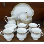 A Royal Doulton Burlington pattern six setting tea service, six cups, saucers and side plates,